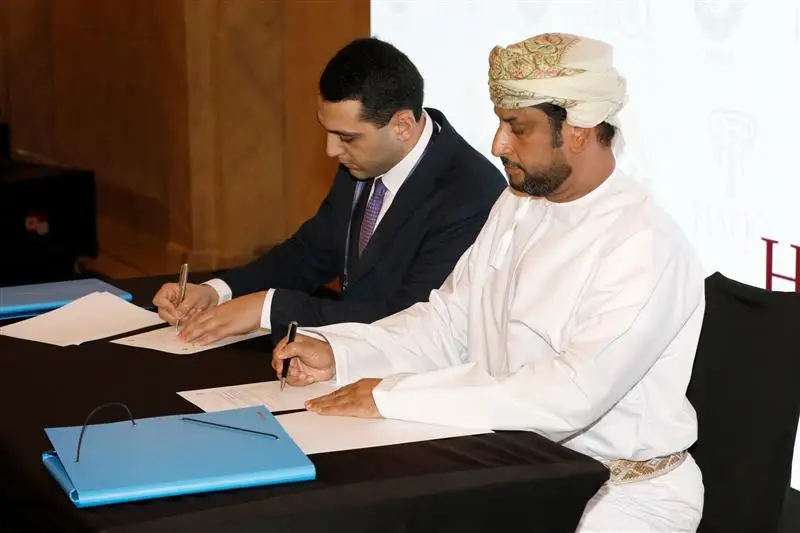 HAQQ and ONEIC representatives signing the MoU