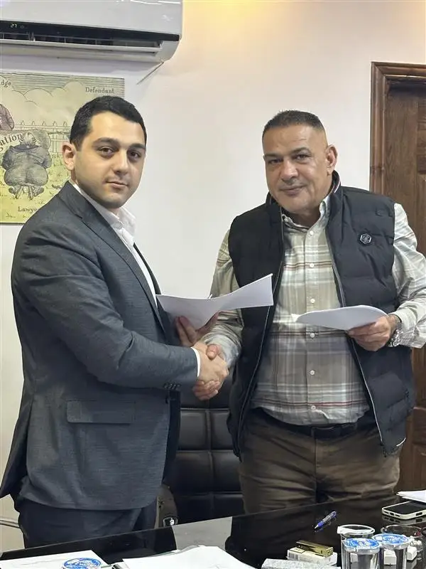Partnership handshake between HAQQ and Jordanian Arbitrators Association