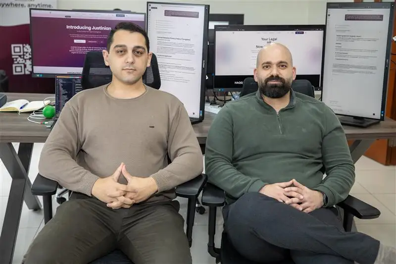 Antoine Kanaan and Abbas M. Kabalan in the HAQQ office, second frame